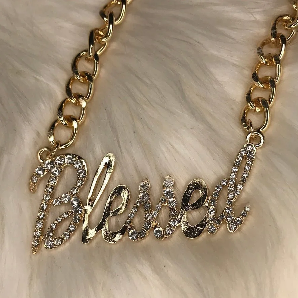 J. ELISE BOUTIQUE GOLD CRYSTAL PENDANT CHAIN LINK NECKLACE AND EARRING SET
